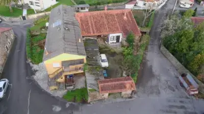 Casa en Venta Ontoria: Piedra Tradicional con Nave Industrial