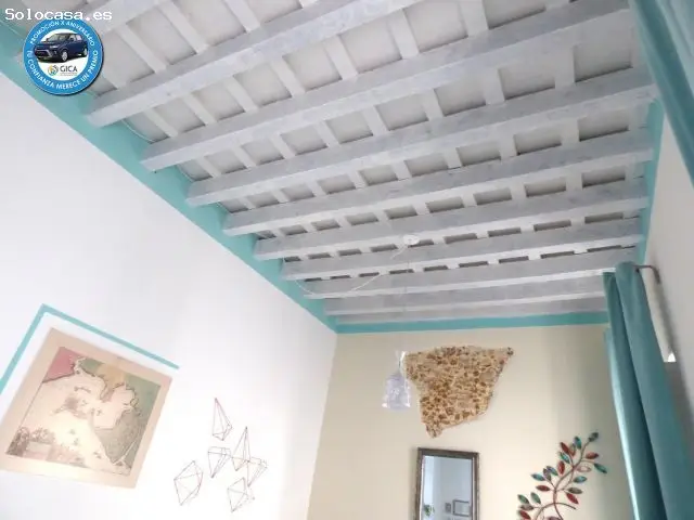 Vivienda Reformada con Local Junto al Mercado Central