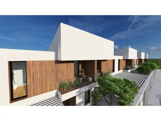 Vivienda Unifamiliar en Carcaboso: Jardín Privado y Diseño Moderno