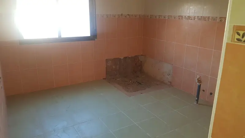 Casa en Venta Nava de Campana: Dos Viviendas Reformadas con Patio y Aparcamiento