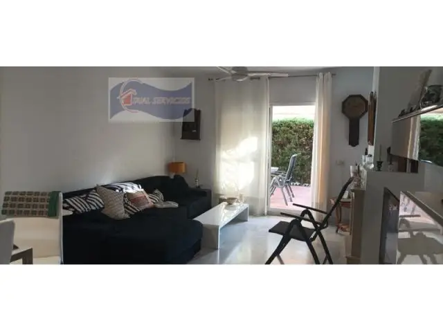 Casa Adosada en Nuevo Portil con Piscina y Pista de Padel