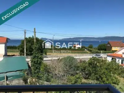 Tres viviendas, una sola oportunidad, propiedad exclusiva con vistas al mar en Portosin