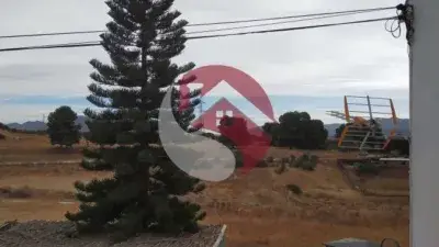 Chalet con Apartamentos y Nave Industrial en Cártama