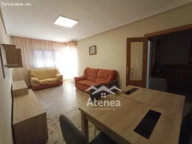 Vivienda en Centro Ciudad: 4 Dormitorios, Garaje y Terraza
