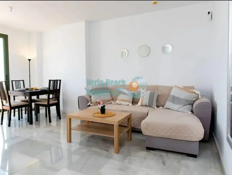 Atico en venta en Nerja con vistas al mar y piscina