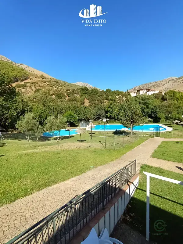 Adosado de Lujo en Urbanización Exclusiva con Vistas Impresionantes