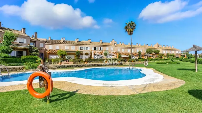 Casa Adosada en Novo Sancti Petri con Piscina