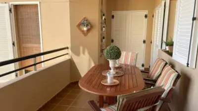 Apartamento en primera linea de playa con piscina y garaje