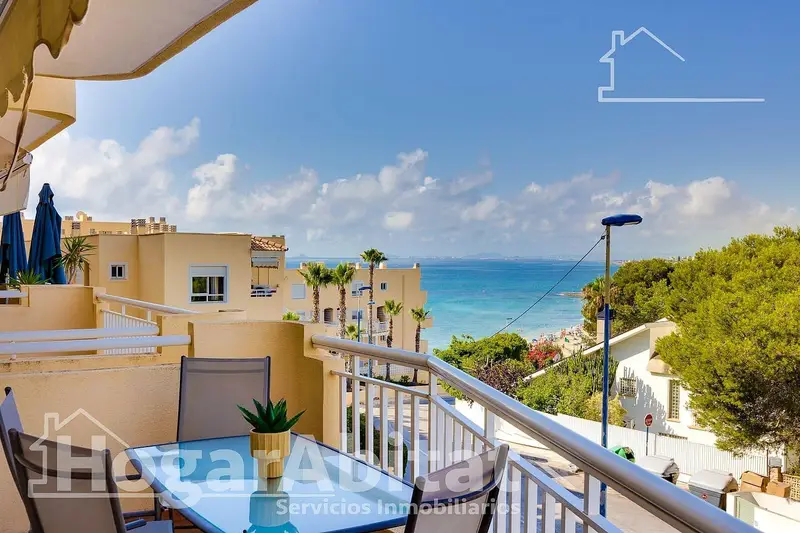 Piso en Orihuela Costa con Piscina y Terraza Primera Linea de Playa