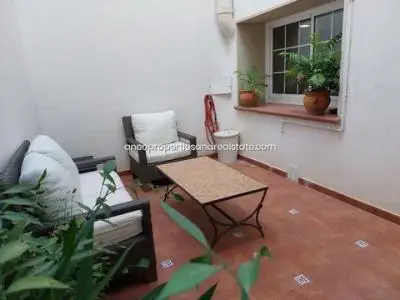Casa Adosada Reformada con Terraza y Solar Anexo