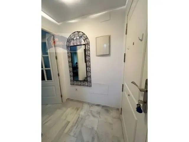 Apartamento en Nuevo Portil Huelva con Piscina y Garaje