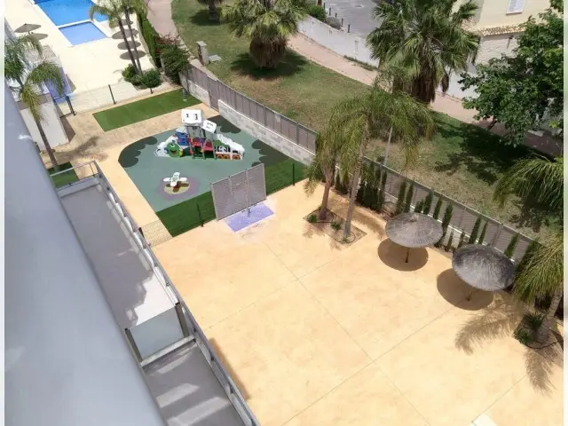 Atico en Oliva con Terraza Privada y Vistas al Mar