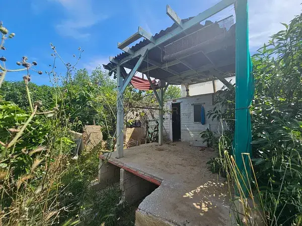 Terreno Rustico 1200m2 con Casa Container y Almacen Malaga Campanillas