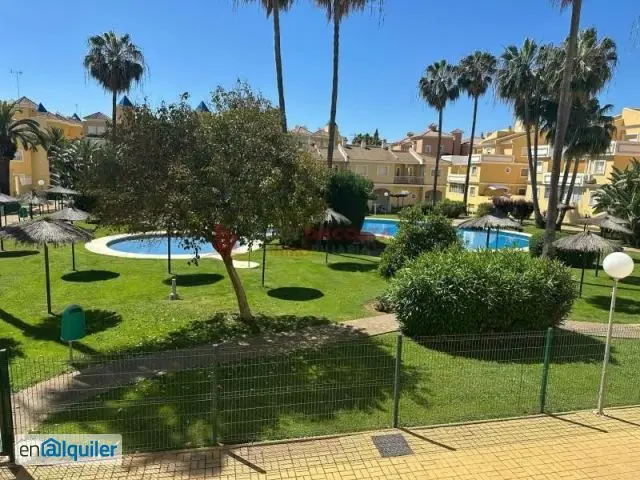 Vivienda en Planta Baja Islantilla con Terraza y Vistas a Piscina