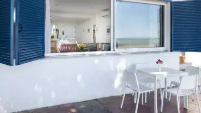 Casa en Primera Línea de Playa en El Palo Málaga