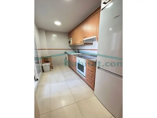 Apartamento en Daimús primera línea de playa con piscina garaje y trastero