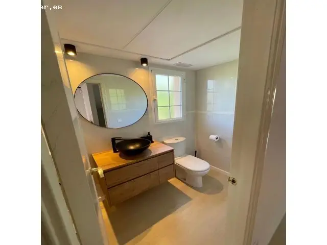 Chalet Adosado Reformado en Bétera con Piscina y Vistas al Golf