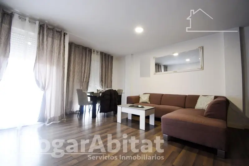 Adosado Reformado en Riola con Garaje y Terraza