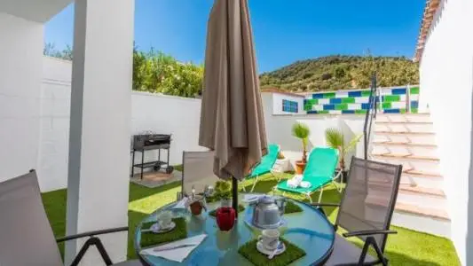 Casa Cortes en Cortes de la Frontera: Casa de Pueblo con Piscina
