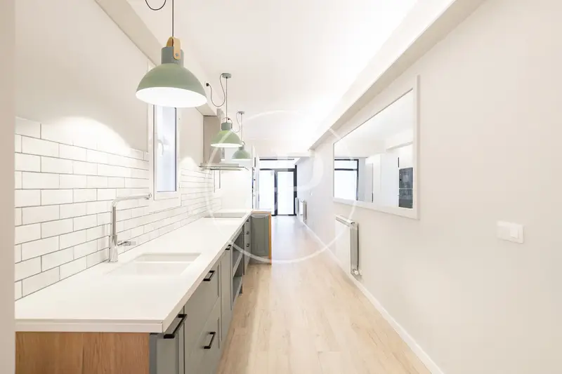 Loft en Sarrià: Planta Baja Reformada 125m²