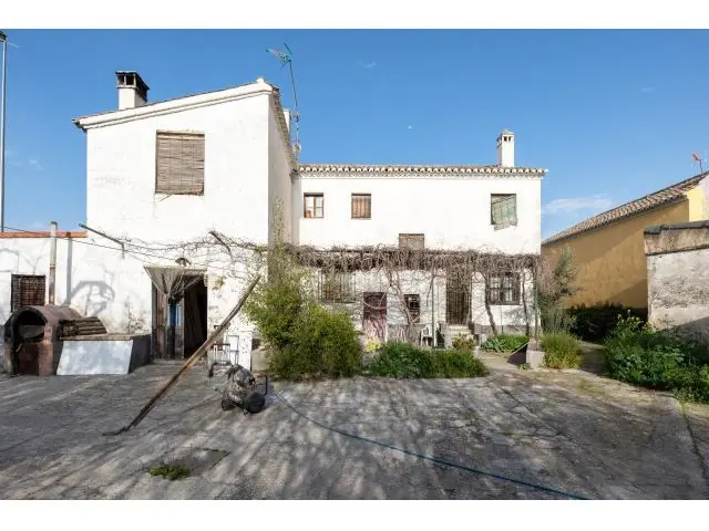 Casa Cortijo con Parcela Rústica de Riego
