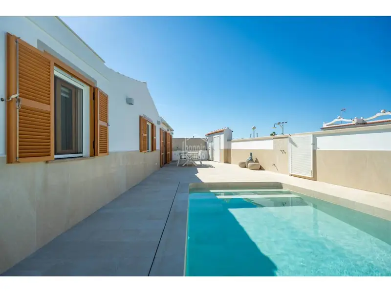 Chalet Adosado en Calan Blanes Menorca con Piscina