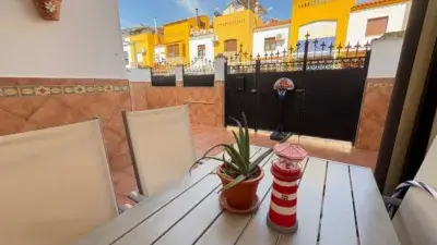 Casa Adosada en Aljaraque con Piscina y Zonas Comunes