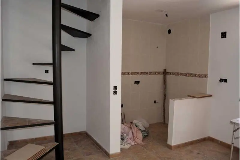 Dos Casas Adosadas en Periana: Ideal Inversión