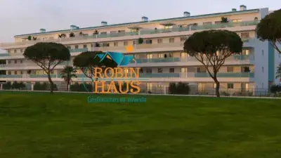 Apartamentos en Nuevo Portil con Vistas al Golf