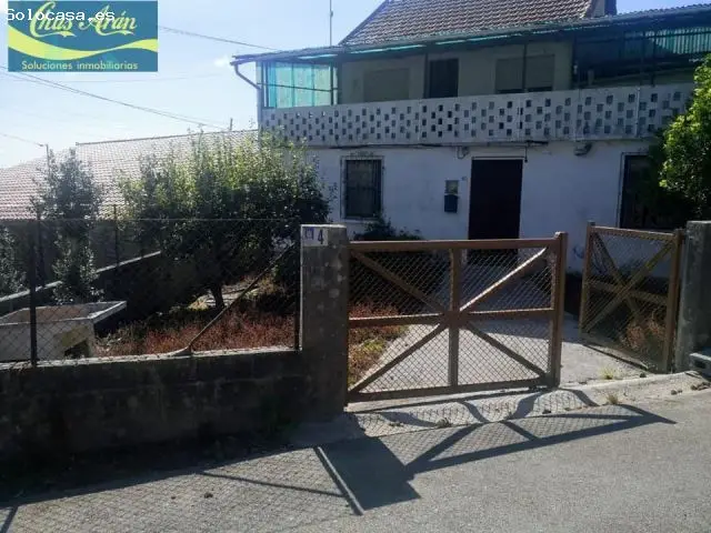 Casa en Laracha para reformar con garaje y terrenos