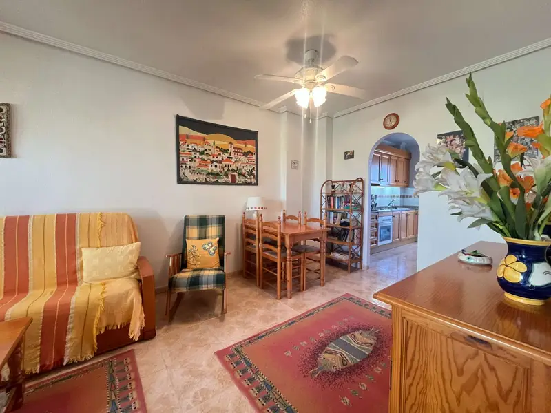 Apartamento en Punta Prima con Piscina y Vistas al Mar