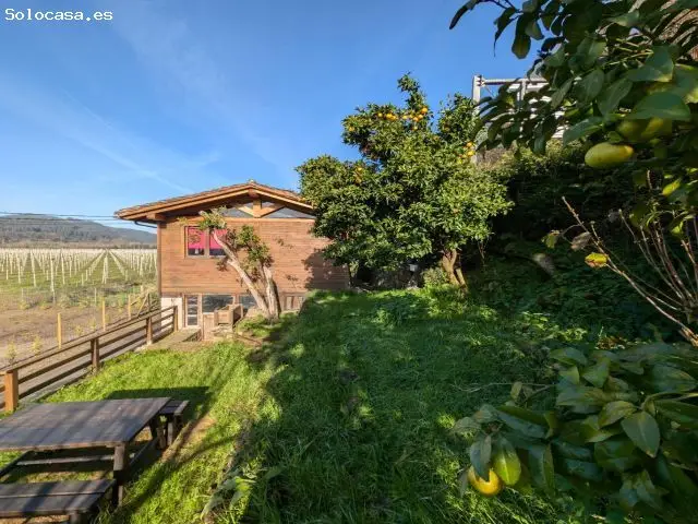 Casita de Madera en Asturias con Horreo y Cuadra