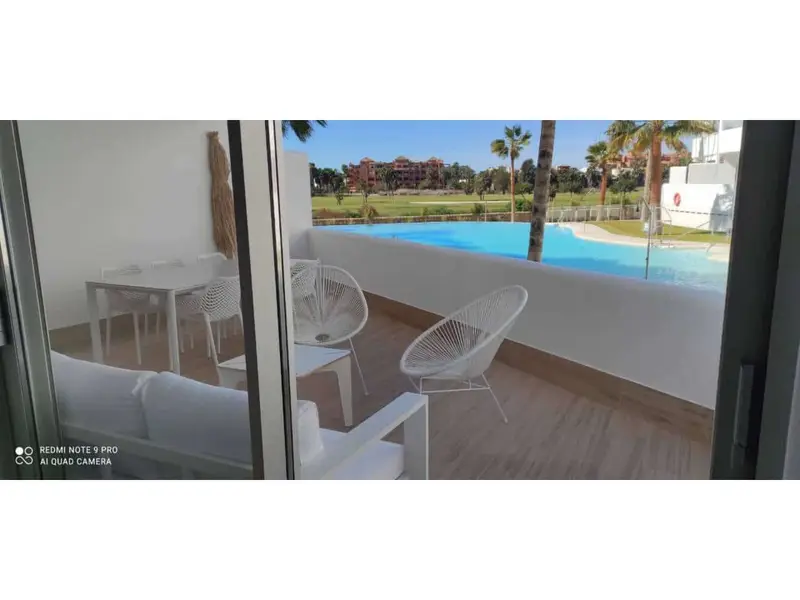Apartamento en Motril con Vistas al Golf y Piscina