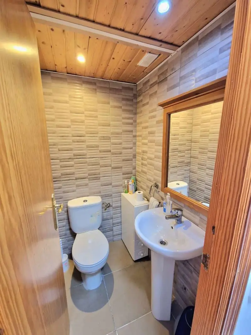 Adosado en Venta Cala de Bou Ibiza: 3 Dormitorios, Azotea Privada y Garaje