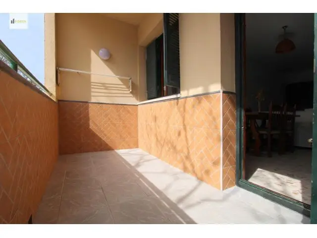 Piso con Terraza Cerca de la Playa Dos Dormitorios