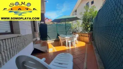 Piso en venta en Somo planta baja con terraza cerca de la playa