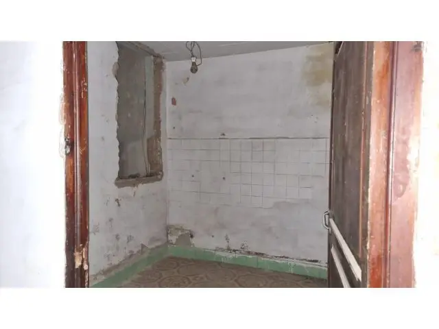 Casa con Terraza y Posibilidades de Reforma en Zona Céntrica