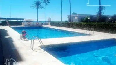 Piso en Primera Linea de Playa Torrenostra con Piscina