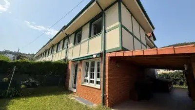 Casa pareada en venta en Mioño: Chalet con jardín y garaje
