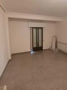 Casa Adosada en Tomelloso con Cochera y Buhardilla